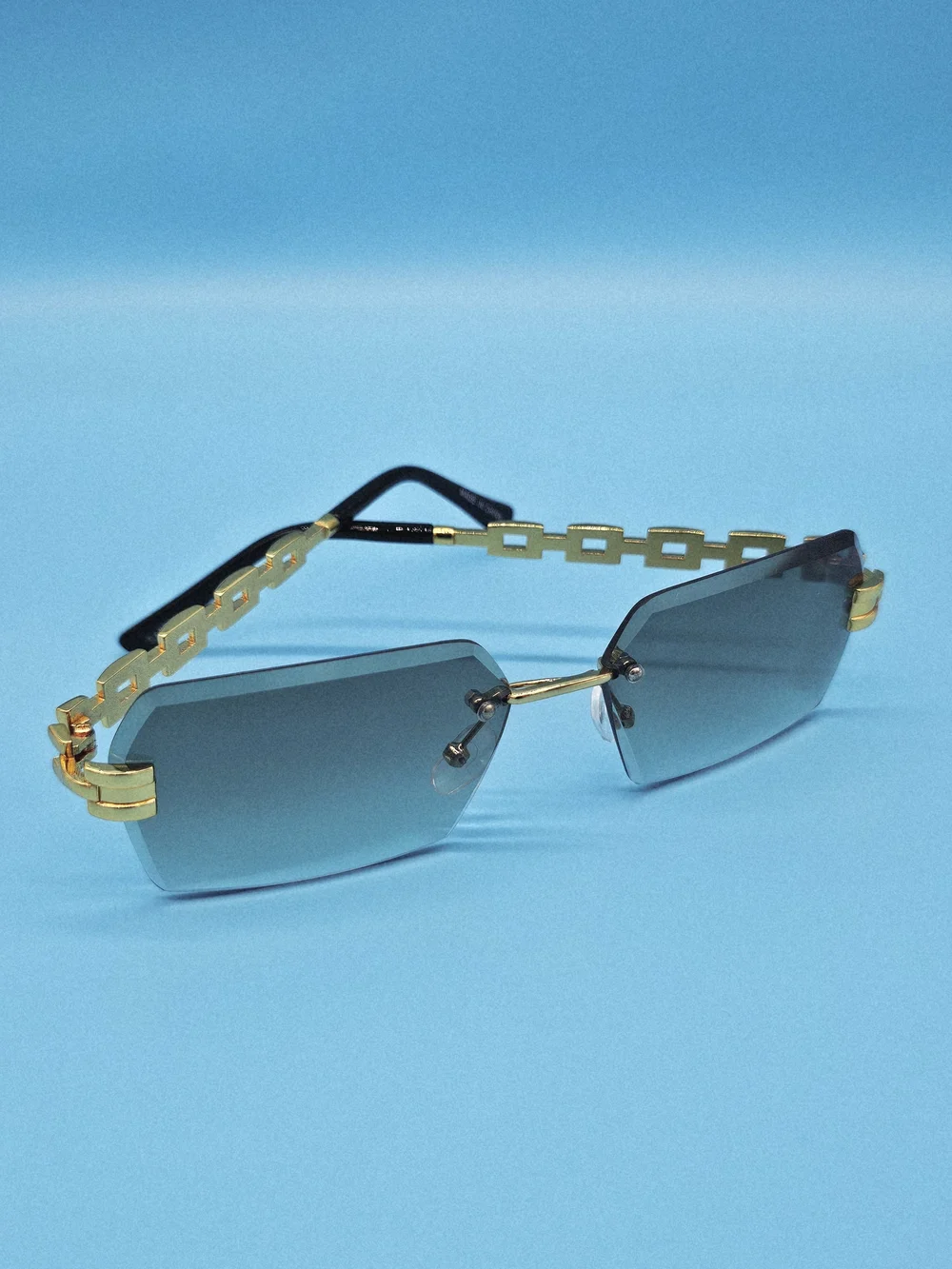 Gold-Accented Rimless Gray Sunglasses - Unisex Accessories